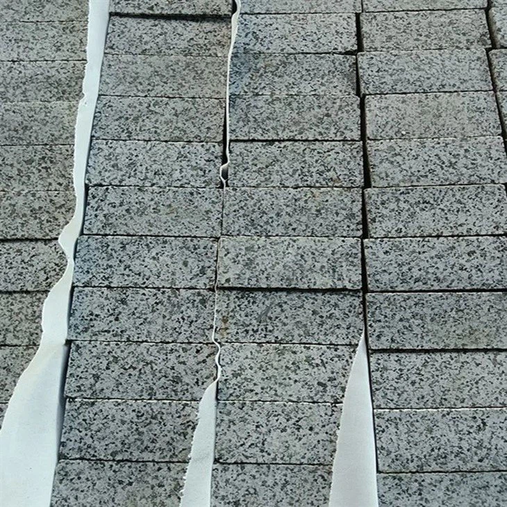 Laying-Granite-Cobble-Setts-Edging-for-Sale.webp (3)(001)